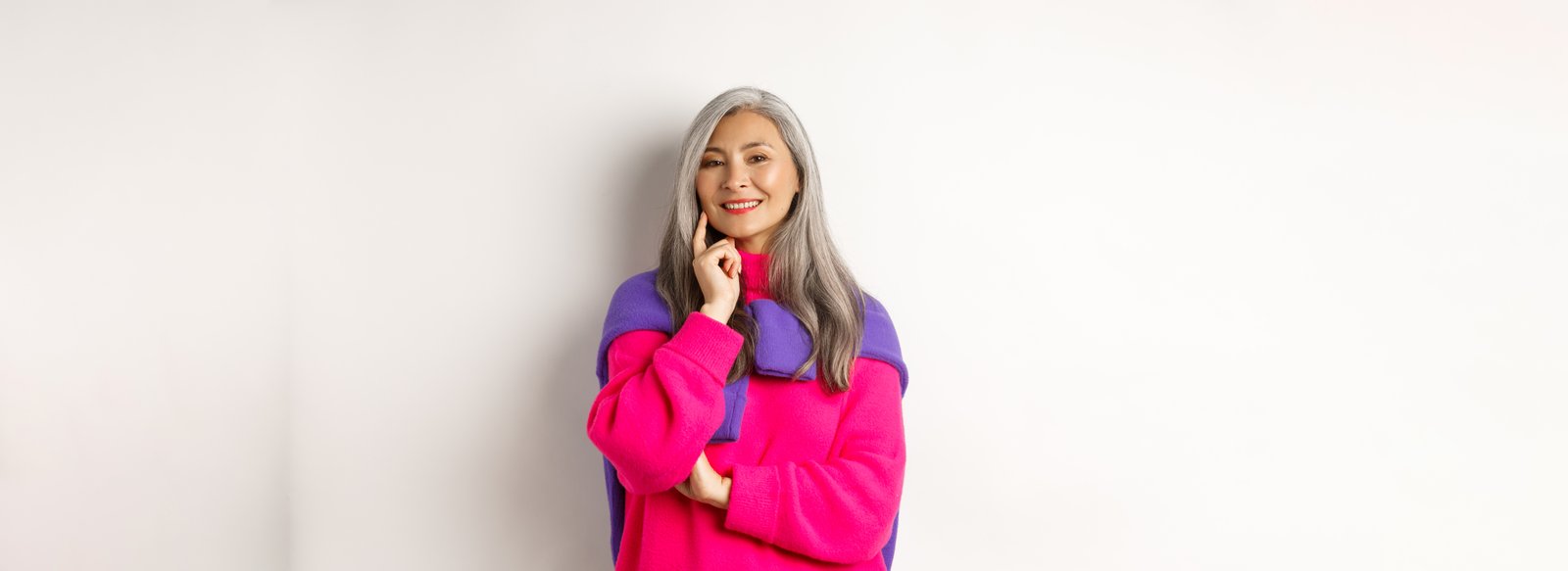 Woman applying a bond-repair hair treatment