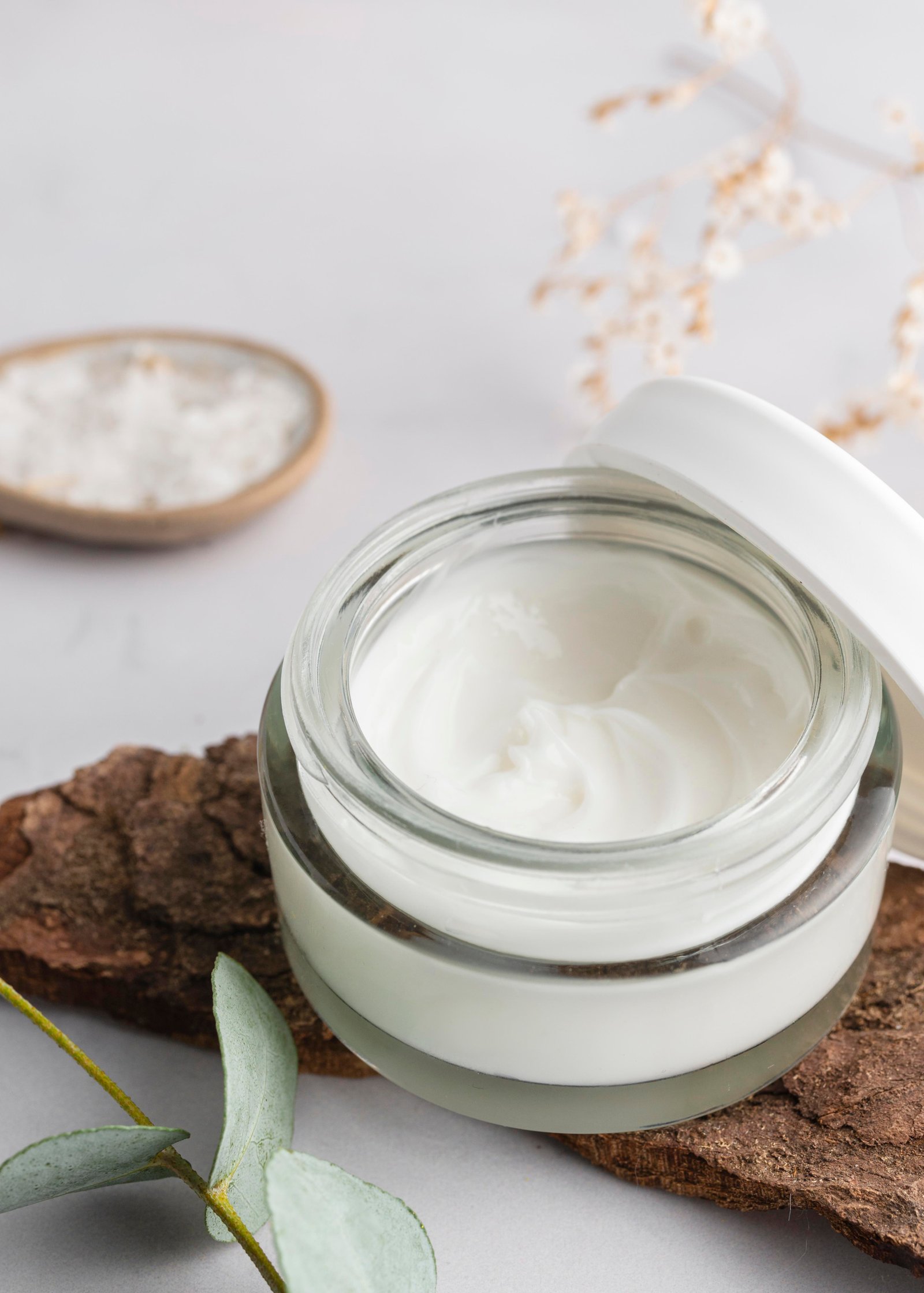 Woman applying a lightweight daily moisturizer